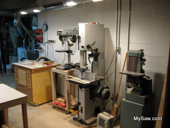 The machine wall.  Moved the Drill press it's own table.